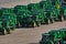 Fleet of tractors lined up in a shipping yard