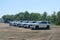 A fleet of White Chevy Tahoe equipped with Feniex Emergency Products