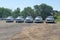 A fleet of White Chevy Tahoe equipped with Feniex Emergency Products