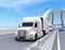 A fleet of white self-driving Fuel Cell Powered American Trucks driving on highway