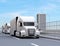 A fleet of white self-driving Fuel Cell Powered American Trucks driving on highway