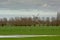 Flemish farmland landscape with traditional windmill