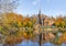 Flemish style building reflecting in Minnewater lake, Bruges