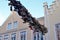 Flensburg, Germany - June 09, 2019: Shoes hanging between old houses in the german northernmost town called Flensburg