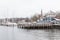 Flensburg town in winter. Coastal cityscape under cloudy sky