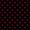 Fleur de lis french damask pattern in black and red color. Ornamental fabric swatch close-up.