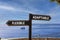 Flexible or adaptable symbol. Concept word Flexible Adaptable on beautiful signpost with two arrows. Beautiful blue sea sky with