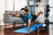 Flexible and dexterity man in sportswear doing reverse gaiety yoga position