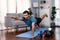 Flexible and dexterity man in sportswear doing reverse gaiety yoga position