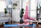 Flexible and dexterity woman in sportswear doing reverse gaiety yoga position