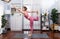 Flexible and dexterity woman in sportswear doing reverse gaiety yoga position