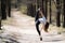 Flexible female gymnast makes exercise in the forest. Healthy lifestyle