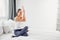 Flexible female yogi stretching