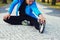 Flexible fitness man in a blue sports jacket.