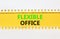 Flexible office symbol. Concept words Flexible office on beautiful yellow paper. Beautiful white paper background. Business