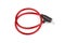 Flexible red bicycle cable with key on white background.  Security and safety concept