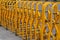 Flexible temporary fencing of yellow painted metal