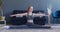 Flexible woman practicing yoga, doing splits exercise