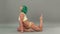 Flexible woman in underwear doing split
