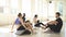 Flexible yogi people practicing yoga or pilates, sitting in fitness studio.