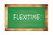 FLEXITIME text written on green school board