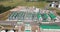 flight and aerial panoramic view over agro silos granary elevator