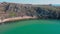 Flight along an abandoned bay with rocks