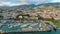 flight around the white town with red roofs. Aerial view of Madeira, Portugal.