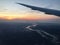 Flight Arriving in London during Sunrise during Fall.