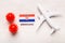 Flight ban and closed borders for tourists and travelers with coronavirus covid-19. Airplane and flag of Croatia on a