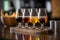 Flight of beer for tasting on a bar counter with a blurred background, generative AI