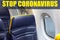 Flight cancelled. Coronavirus, warning sign with text Stop Coronavirus in empty airplane cabin.Cancelled flight, no travel,stop