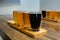 Flight craft beer glasses on wooden tray