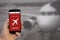 Flight delayed notification on Smartphone announces bad news to tourist