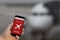 Flight delayed notification on Smartphone announces bad news to tourist