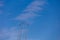 Flight of five cessna planes over alicante smoke spanish flag against the blue sky