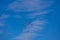 Flight of five cessna planes over alicante smoke spanish flag against the blue sky