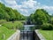 Flight of locks at the historic Canal de Nantes a Brest, France.