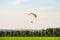 Flight on motor glider over the tops of green trees. Festival of aeronautics `Nebosvod of Belogorie`.