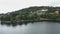 Flight over a beautiful mountain lake with a scenic background