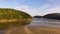 Flight over beautiful tropical beach Pernambuco in Guaruja. Waves crashing on rocks, sea green