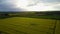 Flight over British countryside with green and yellow fields