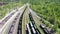 Flight over cargo trains carriage at railway station. Aerial view of railroad rail yard. Many trains