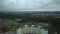 Flight over the city block in cloudy weather.