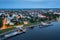 Flight over evening city of Uglich and Epiphany Cathedral on banks of Volga River