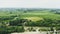 Flight over the fields of wheat by the river Danube