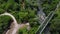 Flight over the fiver and railway metal green bridge over the river. Aerial bird view