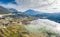 Flight over the flooded valley in Greece. The flooded fields, roads, mountains on background, the inhabited settlement