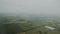 Flight over green cultivated farming fields, crop harvesting, sowing campaign