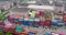 Flight over a large warehouse with shipping containers. Large warehouse with shipping containers aerial view